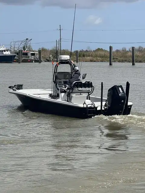 The Southern Delta Charters bay boat idling out of the marina in Venice, Louisiana